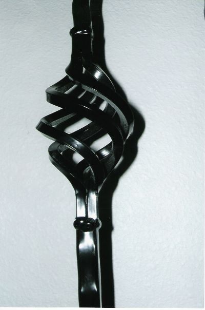 Hand-forged iron furniture detail crafted in Nampa, Idaho