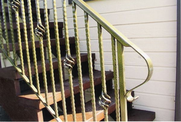 Interior iron staircase railing hand-forged for a Treasure Valley staircase