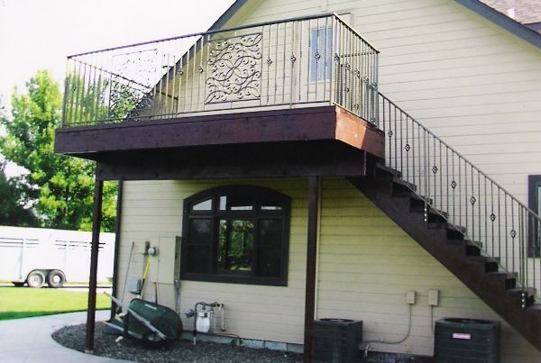 Custom wrought iron staircase railing installed in a Nampa, Idaho home