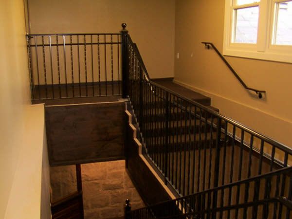 Hand-forged interior iron stair railing in a Nampa, Idaho home