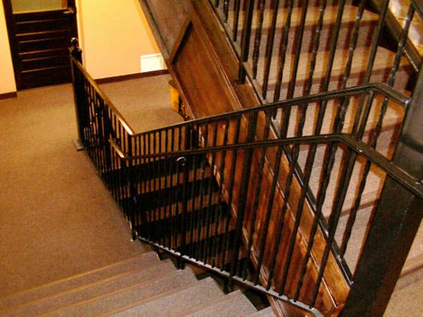 Interior hand-forged iron stair railing
