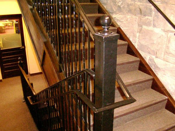 Wrought iron stair railing with powder-coated finish in a Treasure Valley home